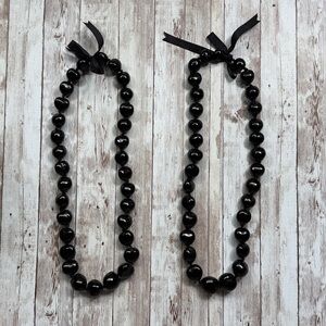 2 Hawaiian Kukui Nut Lei Necklaces Black Beads Ribbon Tie
